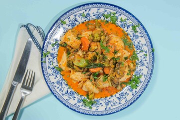 Thick chiken soup with spicies, vegetables and herbs.