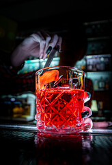 woman hand bartender making cocktail in bar