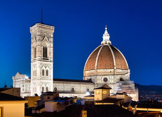 Florence Duomo and Campanile - Bell Tower - architecture illuminated by night, Italy. Urban scene in exterior - nobody.