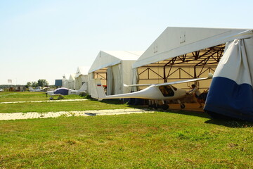 White Airplane White hangar Grass Green