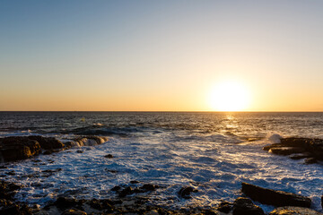 quiet sea coast with stones at the twilight, natural sea background.