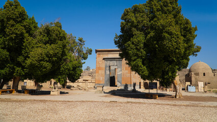 Karnak Temple in Luxor, Egypt. The Karnak Temple Complex, commonly known as Karnak, comprises a vast mix of decayed temples, chapels, pylons, and other buildings in Egypt.