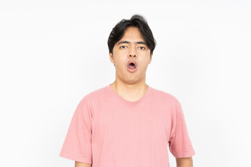 Shocked face of Asian man in shirt on white background.