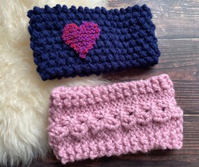 two headbands showing textured hand knitting 