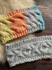 Fototapeta na wymiar knitted headbands using hand knit cable stitch pattern