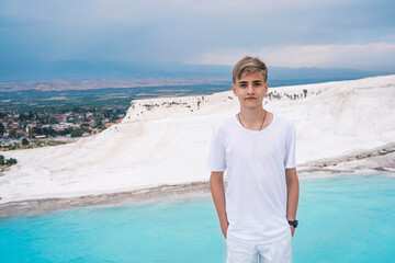 Close up emotional portrait of Caucasian young man 14-17 years old in Pamukkale, Turkey.