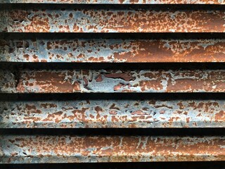 Old iron jalousie. Multicolor, rust, old painted