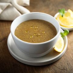 Traditional homemade lentil soup with lemon