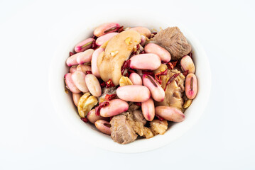 A bowl of stewed pork trotters with green beans