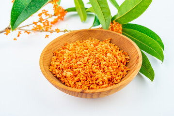 Fresh osmanthus flowers collected on white background