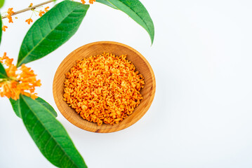 Fresh osmanthus flowers collected on white background