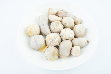 A dish of peeled cooked taro