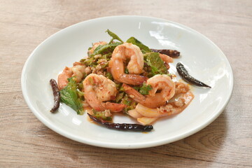 spicy and sour wing bean slice with chop pork topping boiled shrimp Thai salad on dish