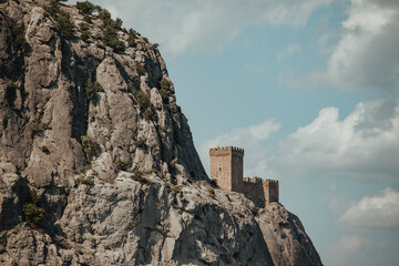 An architectural monument of the Middle Ages. Genoese fortress on a sheer cliff.
