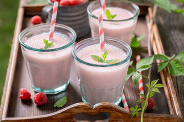 Homemade cocktail with seasonal fruit and milk.