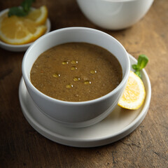 Traditional homemade lentil soup with lemon