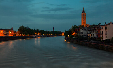 Obraz premium Night city of Verona. Adige river.