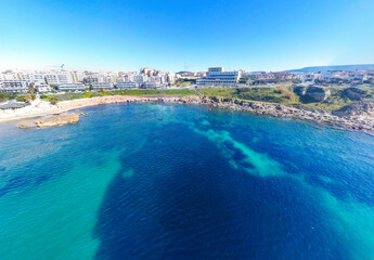 Blue sea in Alghero coastline on a sunny day