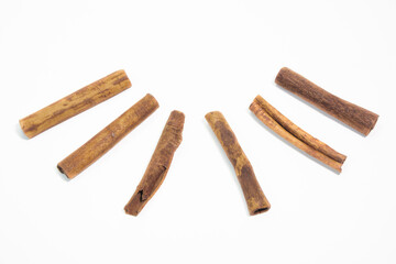 Cinnamon sticks on a white background