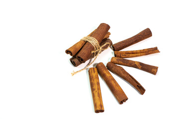 Cinnamon sticks on a white background