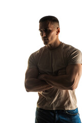 Fototapeta premium Posing and flexing on white background in studio