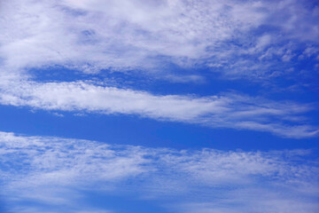 Fototapeta premium Blue sky with light white cirrus clouds.