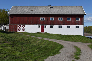 Old red and white barn house in Norway