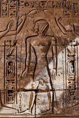 Wall relief of two gods making libation over  Ramesses IV, with the life sign instead of water -...