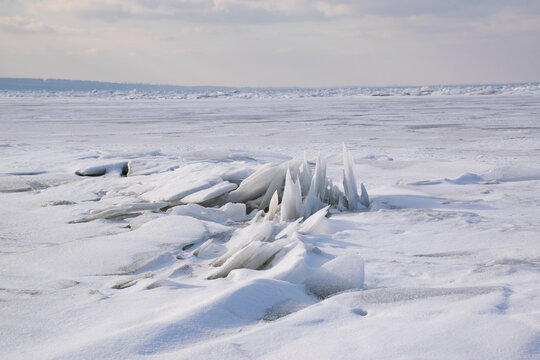 Ice hummocks. Winter, frozen sea, ice.