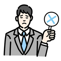 バツの札を持って残念そうな表情のスーツを着た若い男性のバストアップのセット