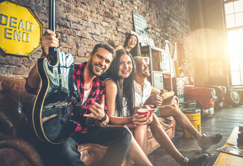 Group of multiethnic friends having fun at home. Teenagers and young people celebrating together....