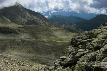 Cloudy Alpine Landscape. Italian Alps