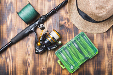 Fishing tools on a wooden table.