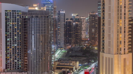 Skyscrapers at the Business Bay in Dubai aerial night timelapse, United Arab Emirates