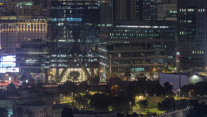 Fototapeta na wymiar Modern buildings around Sheikh Zayed Road and DIFC district aerial night timelapse in Dubai