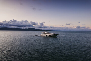 Fototapeta na wymiar Beautiful yacht at sunset in a bay in Brazil.