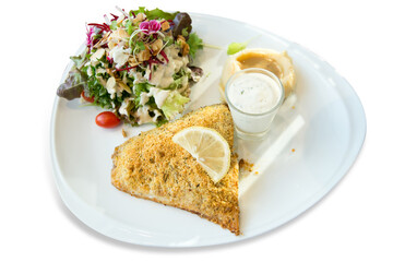 Die cut of Grilled Sea Bass Steak with Salad on white isolated