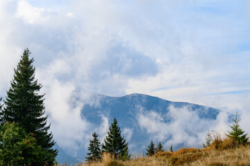 Montenegrin ridge, trails to Mount Petros, mountains in the morning fog.