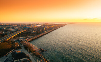 Agigea and Eforie Nord seaside resorts. Aerial view during a beautiful sunrise, Black Sea landmark...