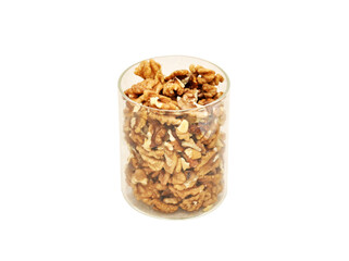 transparent glass pot with walnuts