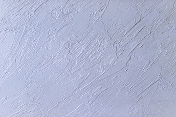 texture of decorative plaster of light.New gray plaster on the wall