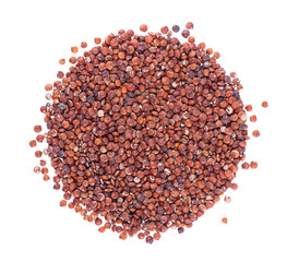 Red quinoa seeds isolated on white background. Pile of raw kinwa. Top view.