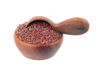 Red quinoa seeds in wooden bowl and spoon, isolated on white background. Pile of raw kinwa.