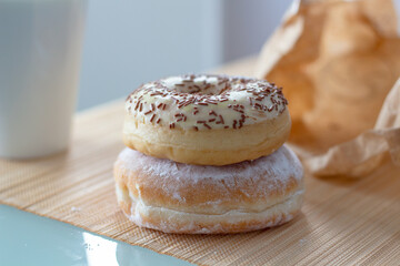 Fototapeta na wymiar Morning breakfast with donuts and coffee. Tasty donuts closeup. Doughnut.
