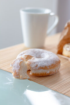 Morning breakfast with donuts and coffee. Tasty donuts closeup. Doughnut.