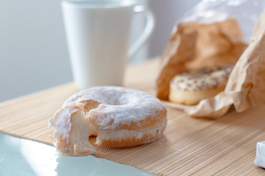 Morning breakfast with donuts and coffee. Tasty donuts closeup. Doughnut.