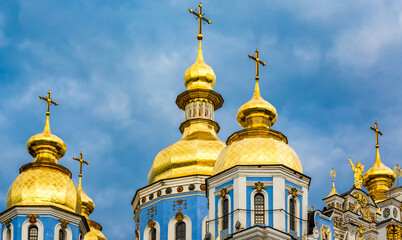 Fototapeta na wymiar Shiny, golden domes of St Michael's Monastery in Kiev