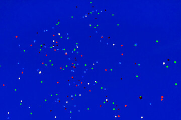 LED balloons in evening dark sky, Valentine's Day. Romantic background