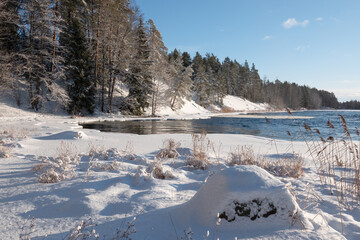 Winter river landscape in frosty weather
