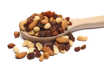 Nuts and raisin, mix peanuts, raisins, hazelnut, almond, cashew in wooden spoon isolated on white 